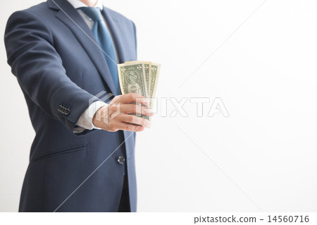 Businessman who takes out banknotes from the chest Businessman who takes out banknotes from the chest 14560716