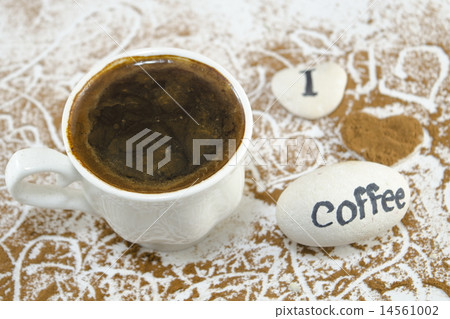 White cup of coffee on decorated table 14561002