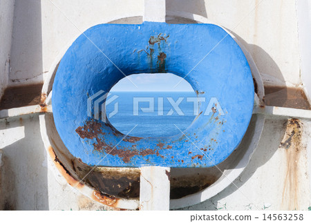 Blue bow hawse in old white rusted ship hull 14563258