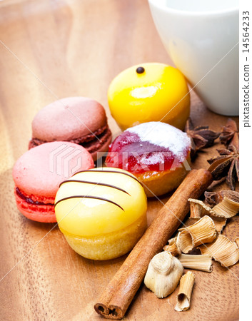 Small cakes on a wooden tray Small cakes on a wooden tray 14564233