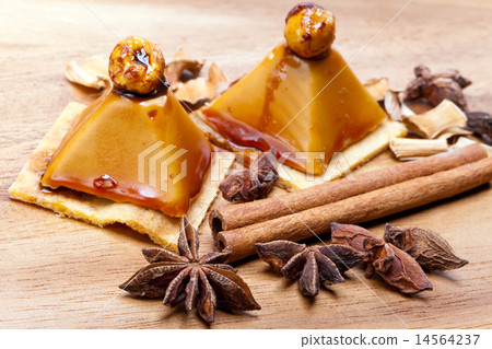 Small cakes on a wooden tray Small cakes on a wooden tray 14564237