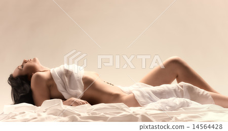 Woman and white sheets 14564428