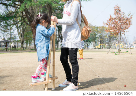 Parent-child practicing stilts Parent-child practicing stilts 14566504