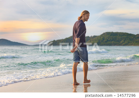 happy young manl on the beach 14577296