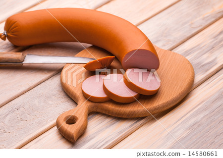 tasty Boiled sausage on the cutting board. 14580661