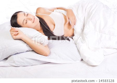 pretty young woman is sleeping in bed pretty young woman is sleeping in bed 14583128