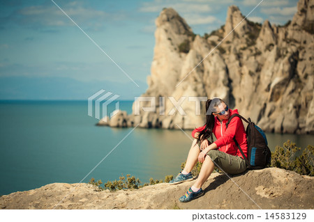 Young lady hiker with backpack Young lady hiker with backpack 14583129