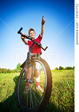 Six year old boy on a bike Six year old boy on a bike 14583752