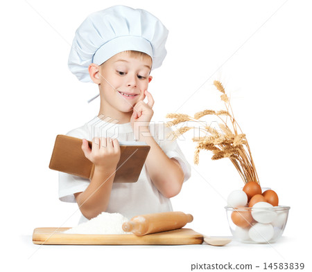 Chef boy is reading a recipe cook 14583839