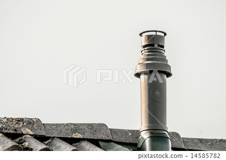Metal chimney on the top a roof 14585782