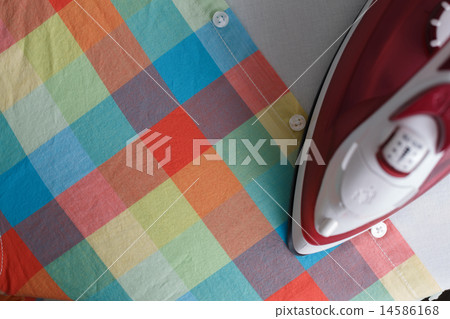 Ironing a shirt 14586168