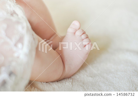 Close up picture of new born baby feet on Close up picture of new born baby feet on 14586732