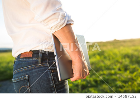 Business woman holding tablet 14587152
