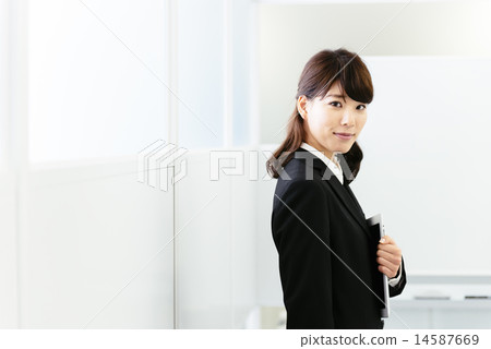 Woman in a suit Woman in a suit 14587669