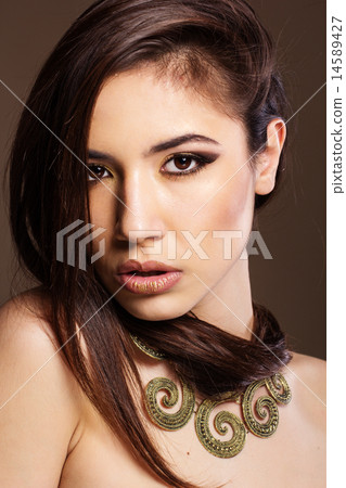 Fashion brunette woman with bijouterie 14589427