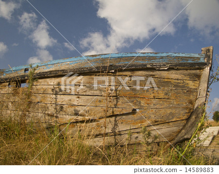 Old nautical vessel-abandoned on the dry land 14589883