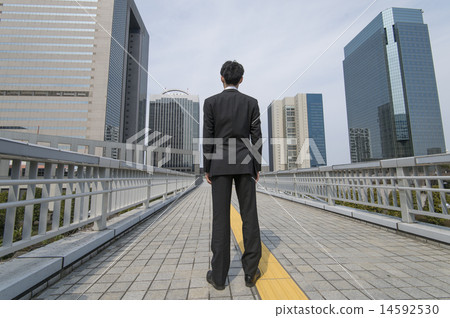 Skyscrapers and businessmen 14592530