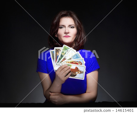 Woman Holding Tarot Cards 14615401