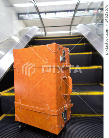 A suitcase placed in the underground shopping center A suitcase placed in the underground shopping center 14628676