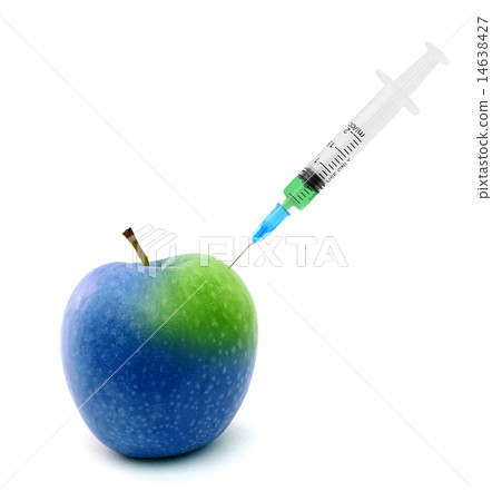 Syringe stuck in an apple 14638427