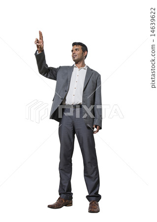 Businessman pushing on a touch screen interface  14639622