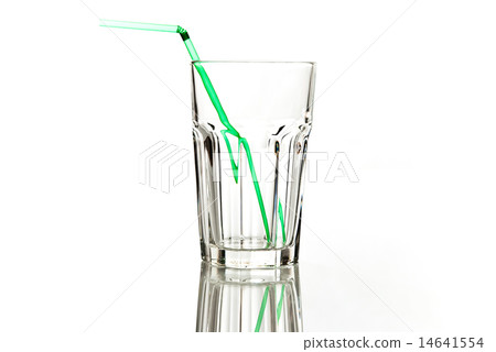 empty transparently glass with green straw 14641554