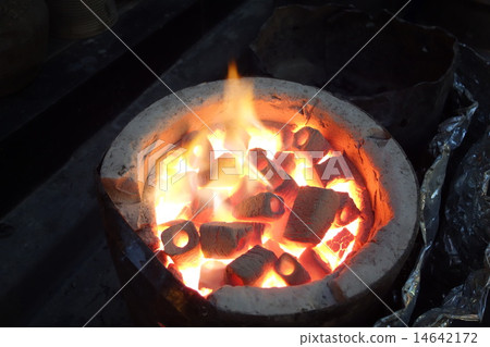 Charcoal fire burned image 14642172