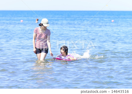 Swimming in the sea 14643516
