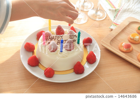 A woman with a candle in a hall cake A woman with a candle in a hall cake 14643686