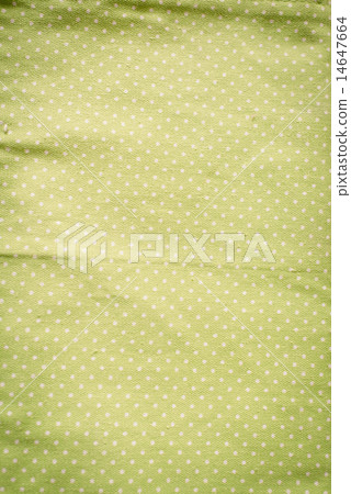 White polka dots on green fabric, vintage style. 14647664