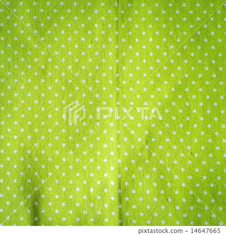 White polka dots on green fabric, vintage style. White polka dots on green fabric, vintage style. 14647665