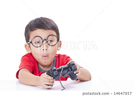Boy playing video game Boy playing video game 14647857