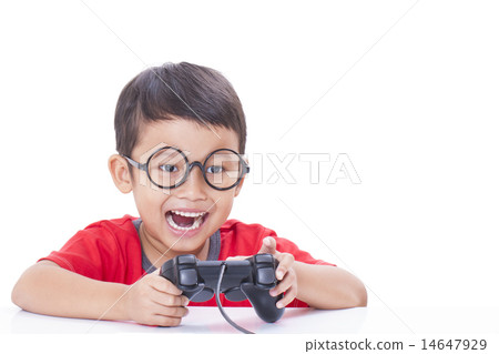 Boy playing video game Boy playing video game 14647929