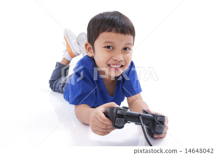 Boy playing video game Boy playing video game 14648042