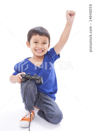 Boy playing video game Boy playing video game 14648059