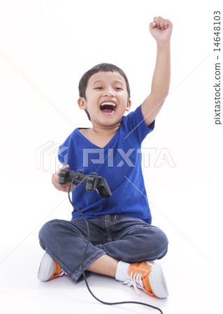 Boy playing video game Boy playing video game 14648103