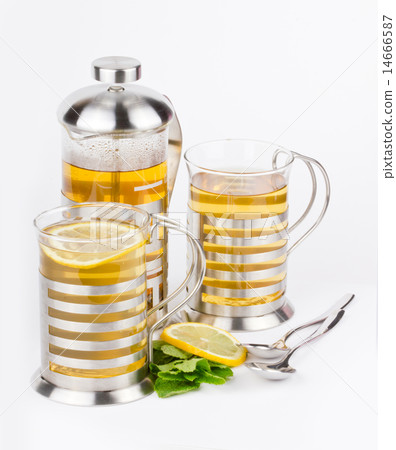 Teapot and cups with mint and lemon Teapot and cups with mint and lemon 14666587