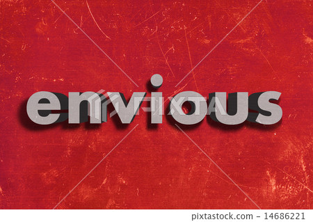 envious word on red wall 14686221