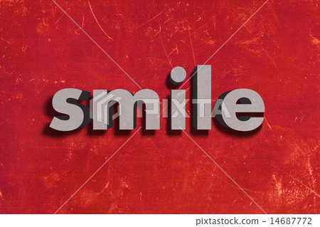 smile word on red wall 14687772