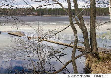 early spring with melting ice snow 14689150