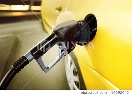 car at gas station 14692043