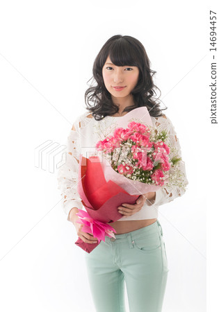 A woman with a bunch of Kanonation bouquets A woman with a bunch of Kanonation bouquets 14694457