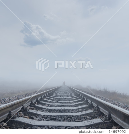 railroad to horizon in fog railroad to horizon in fog 14697092