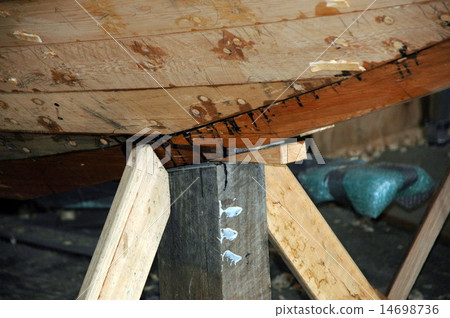 wooden boat building in Tasmanian wharf 14698736