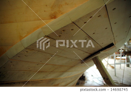 wooden boat building in Tasmanian wharf 14698745