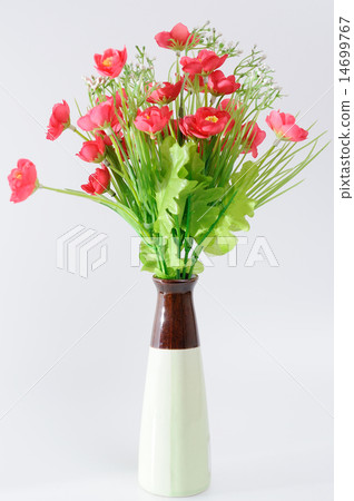 Red flowers in white flower pot, artificially Red flowers in white flower pot, artificially 14699767