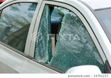 tock Photo: car window smashed by a thief 14701237