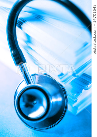 Stethoscope and heap of paper cards 14701645