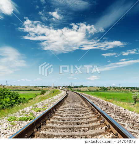 rail road to horizon under deep blue sky 14704872