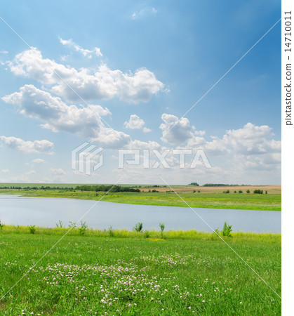 cloudy sky over river 14710011